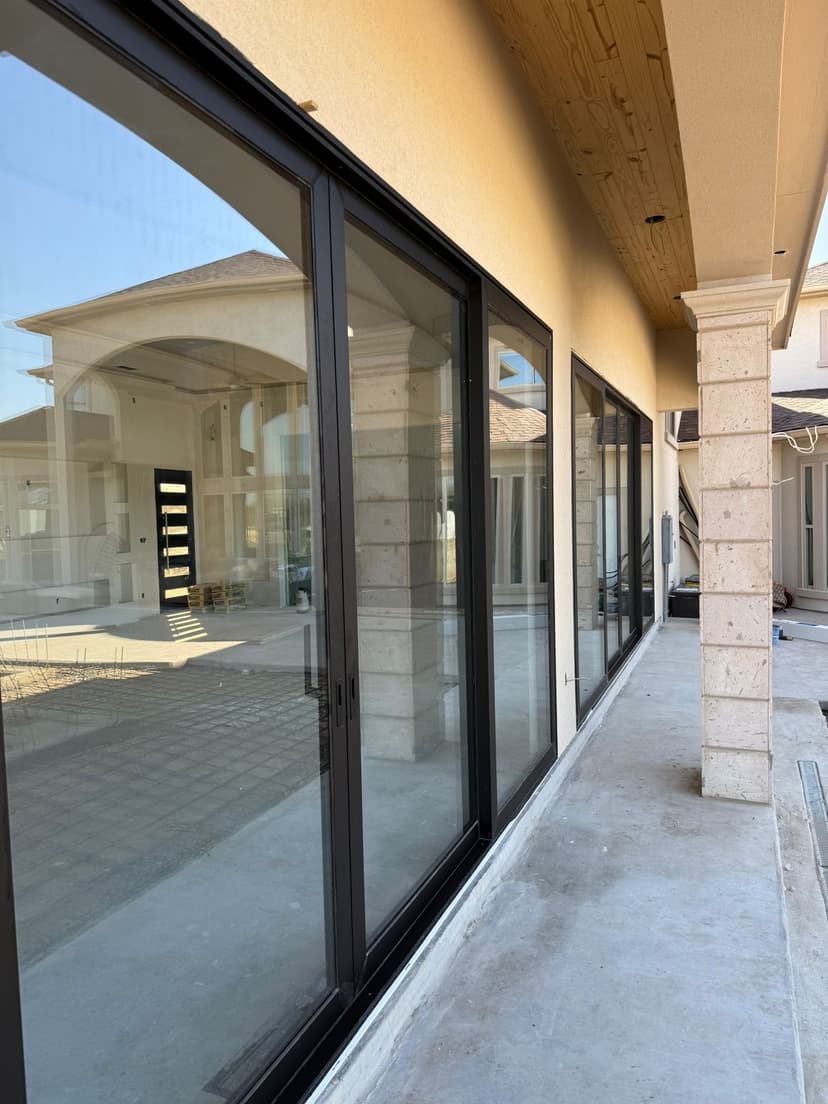 Sliding doors with lift and slide mechanism